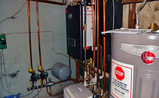 https://carinehotwater.com.au/uploads/2025/06/electric-hot-water-system-58729.jpg