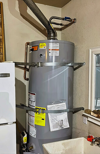 https://carinehotwater.com.au/uploads/2025/06/electric-hot-water-system-58767.jpg