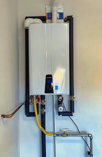 https://carinehotwater.com.au/uploads/2025/06/instant-hot-water-systems-63860.jpg