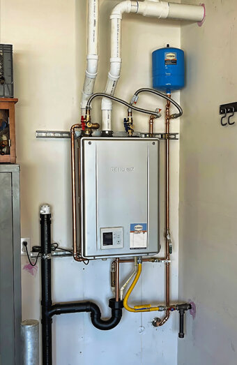 https://carinehotwater.com.au/uploads/2025/06/instant-hot-water-systems-98444.jpg
